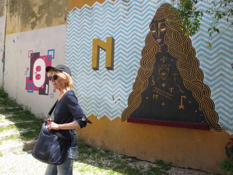 Exploring Lisbon's Hidden Alleys for Secret Street Art Murals