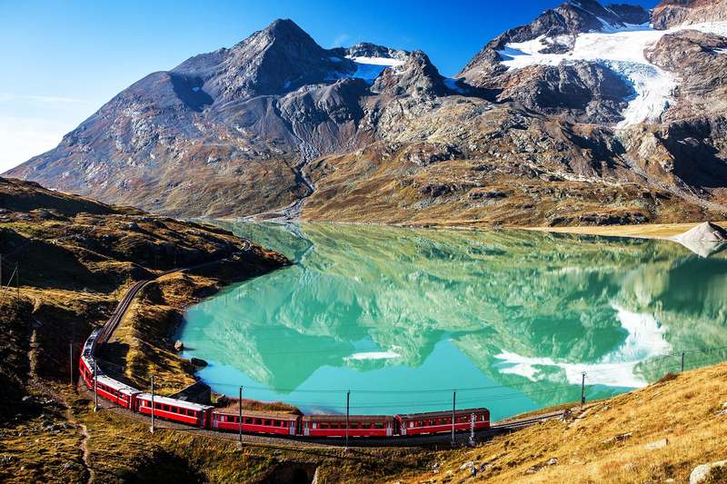 Journey Through the Snow-Covered Alps on the Bernina Express