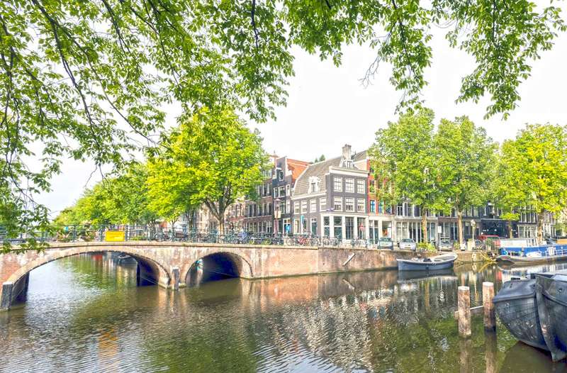 Amsterdam's Canal Belt: A Day's Journey from Dawn to Dusk