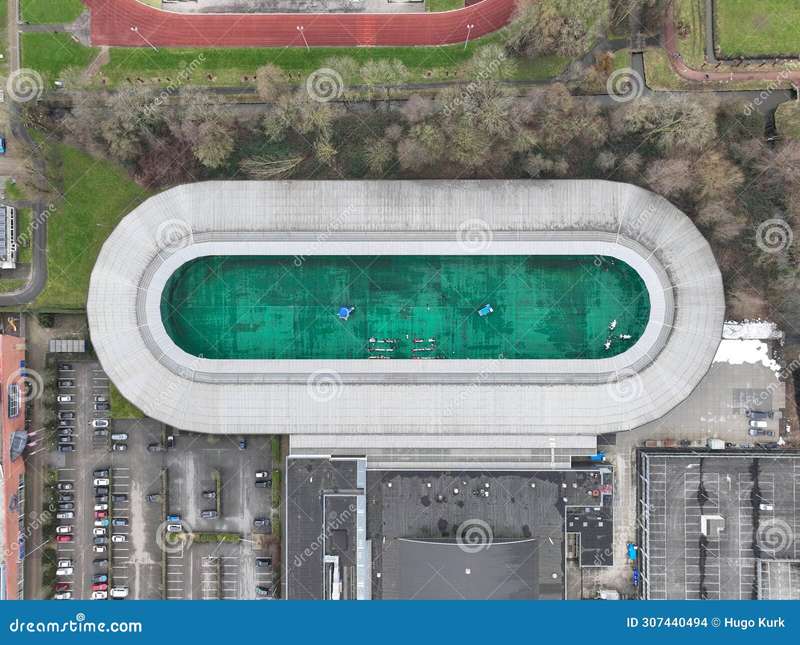 Skating on Ice Rinks in Utrecht's Historic Windmill Village