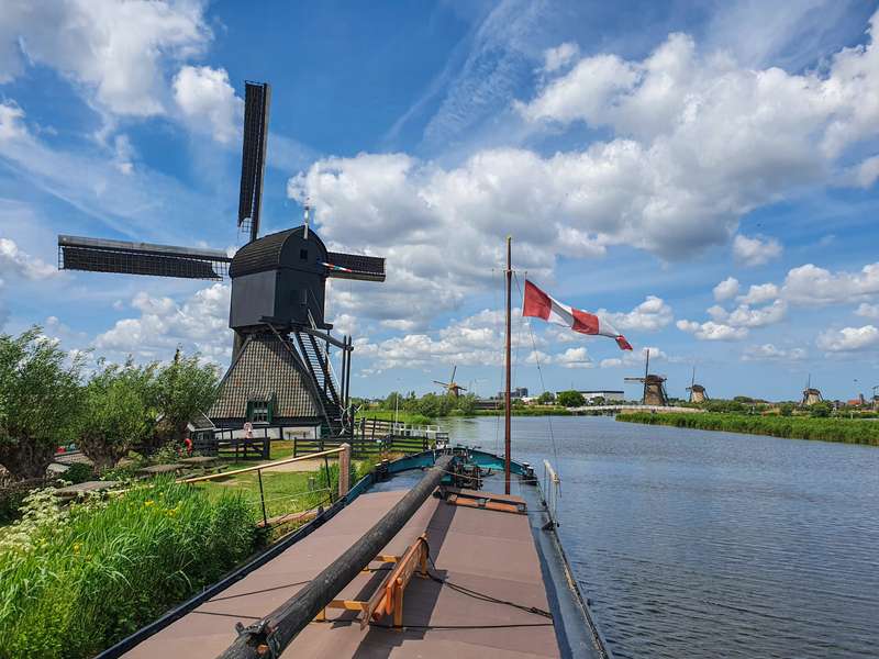 Winter Scenes at Kinderdijk: Snow-Covered Windmills